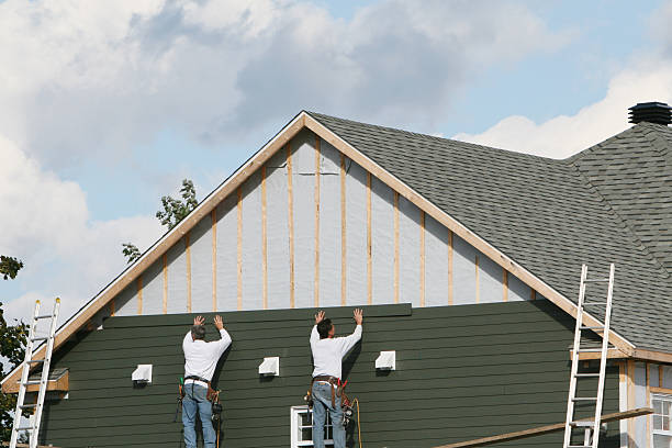 Professional Siding technician working in Newton Lower Falls, MA